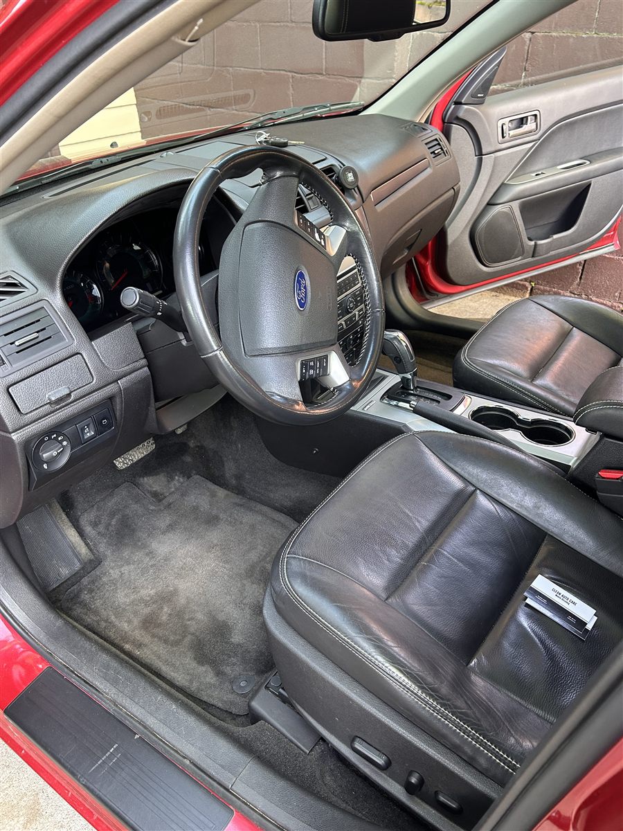 Clean red Ford car interior after detailing